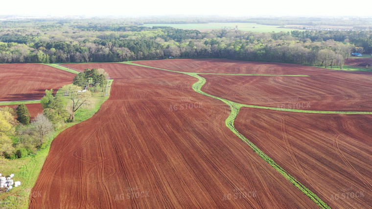 Aerial of Farmstead and Red Soil 79456
