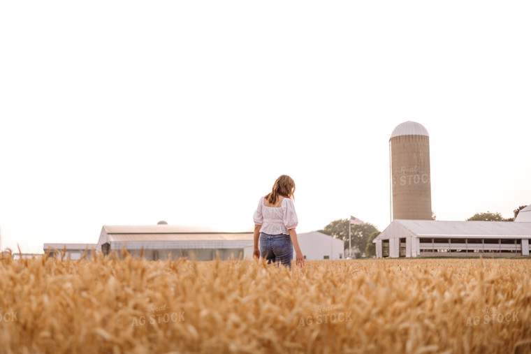 Female Farmer in Wheat Field 116018