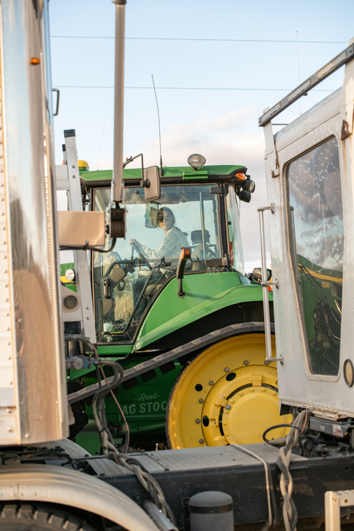 Female Farmer Driving Tractor 76561