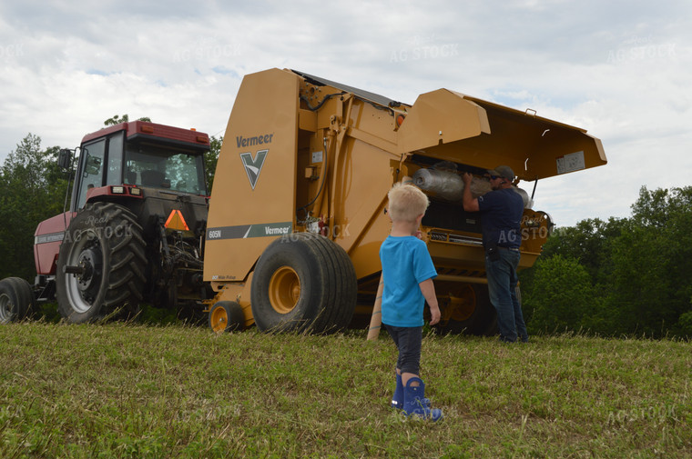 Farm Kid Watching Hay Baling 206037