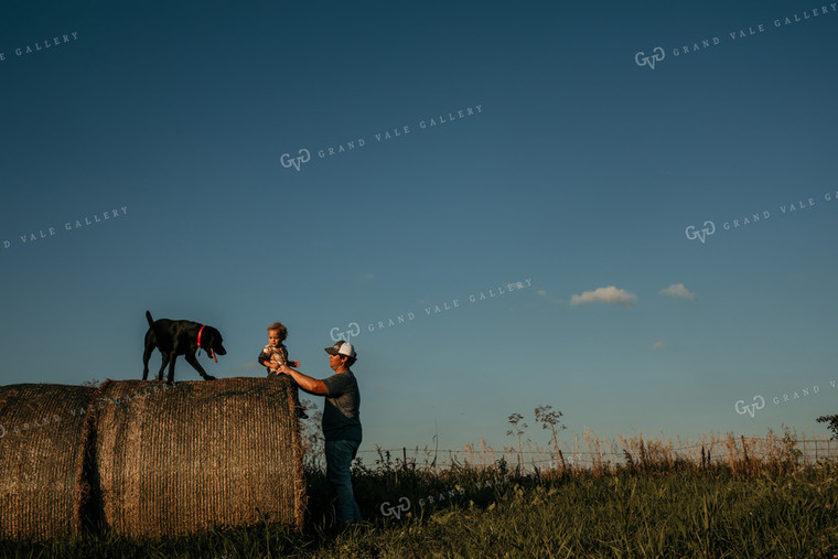 Farmer with Child and Dog Hay Bales 3170