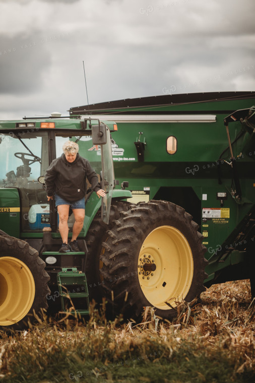 Female Farmer In Auger Wagon 3335