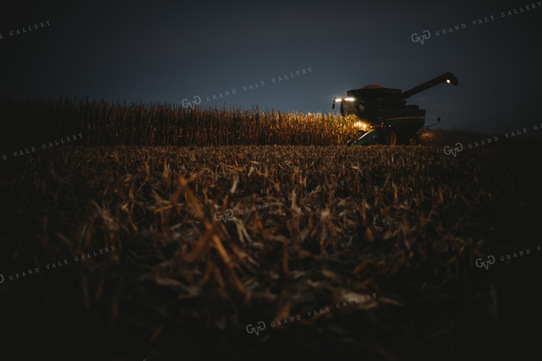 Combine Picking Corn with Lights On at Dusk 3408