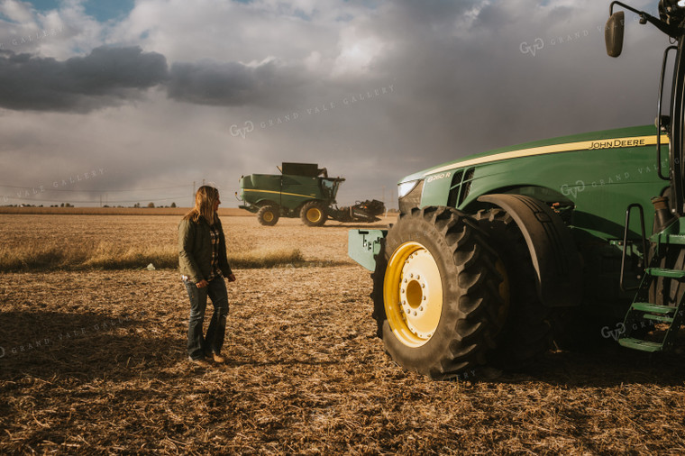 Female Farmer Getting in Tractor 3518