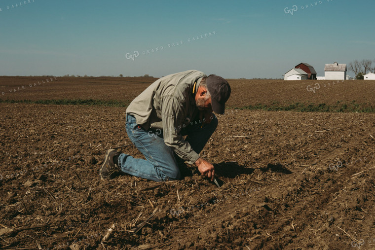 Farmer Checking Planting Depth 4004