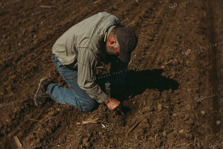 Farmer Checking Planting Depth 4006