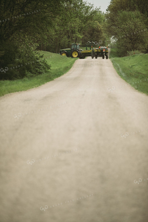 Tractor and Planter Driving Down Road 4016