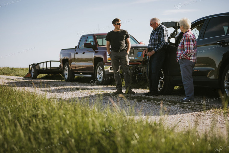 Farmer Grandson Talking to Grandparents Along Field 4168