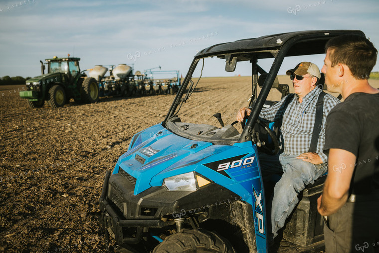 Farmers in Field with UTV and Tractor Planter 4257