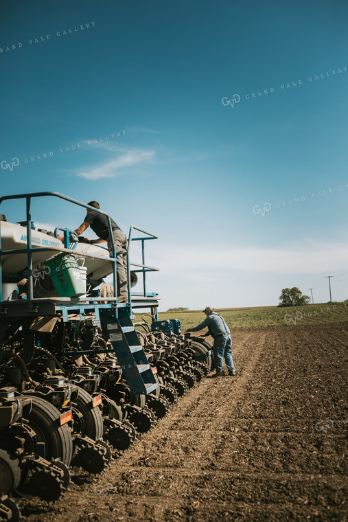 Farmer Checking Seed Level in Bulk Fill Planter 4272