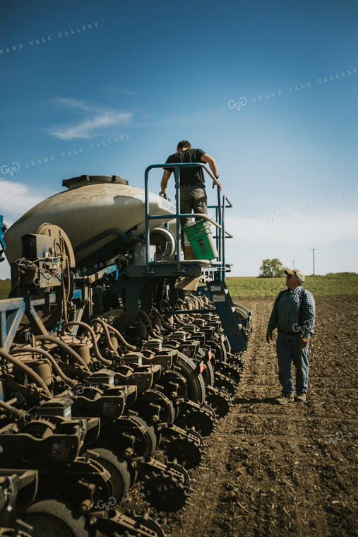 Farmer Checking Seed Level in Bulk Fill Planter 4274