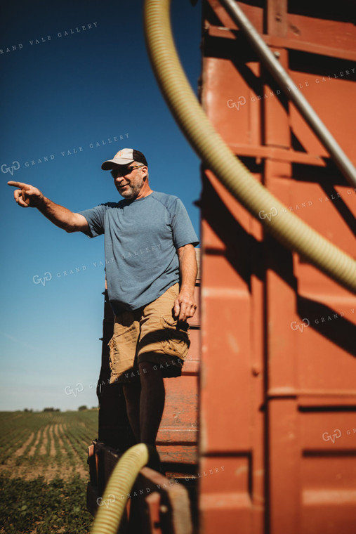 Farmer in Tandem Water Truck Filling Sprayer 4378