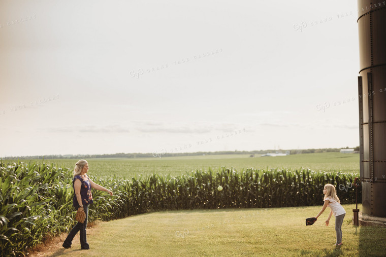 Farm Family Playing Catch Alongside Corn Field 4485
