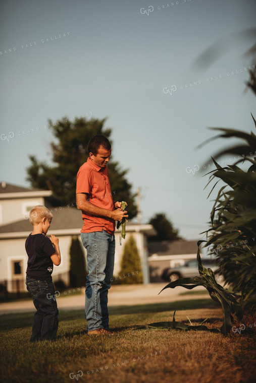 Farmer and Farm Kids Checking Corn Crop 4508