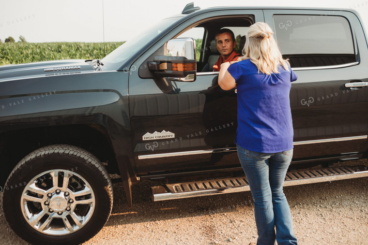 Farm Wife Talking to Farmer inside Pickup Truck 4534