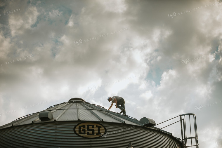 Farmer On Top of Grain Bin 4804