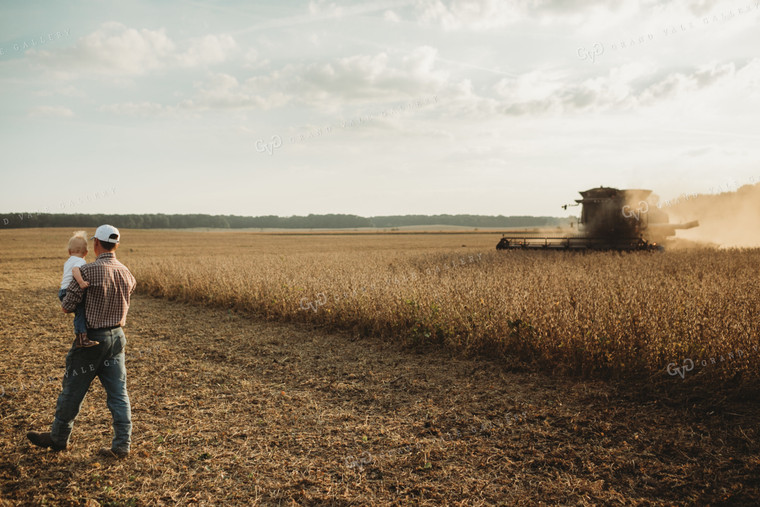 Farmer and Farm Kid Watching Combine 4826