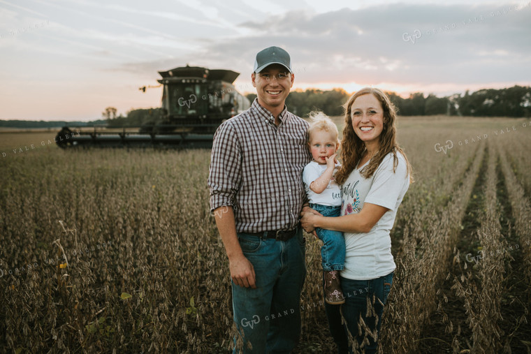 Farm Family Standing in Dried Soybean Field at Sunset 4973