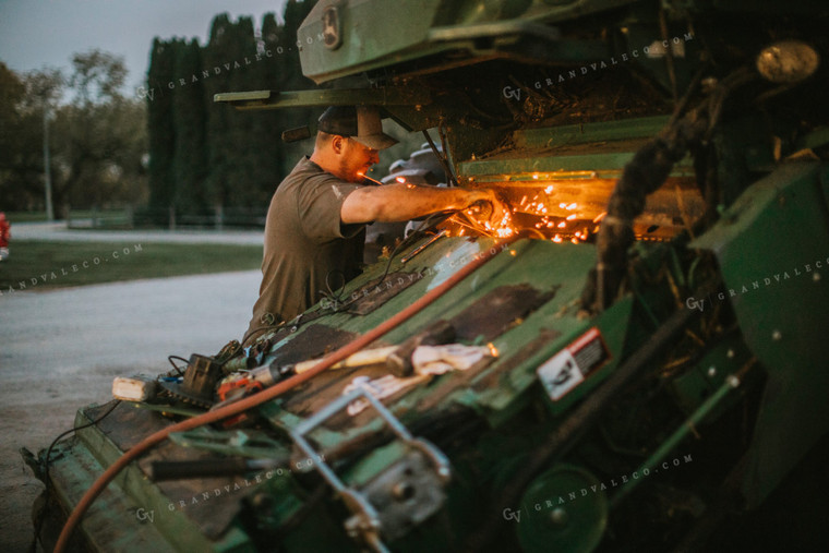 Farmer Working on Combine 5153