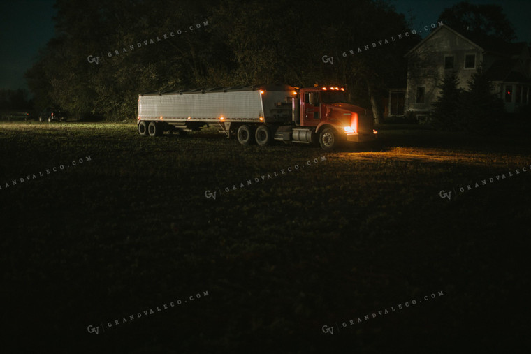 Semi Truck Pulling out of Soybean Field at Night 5155