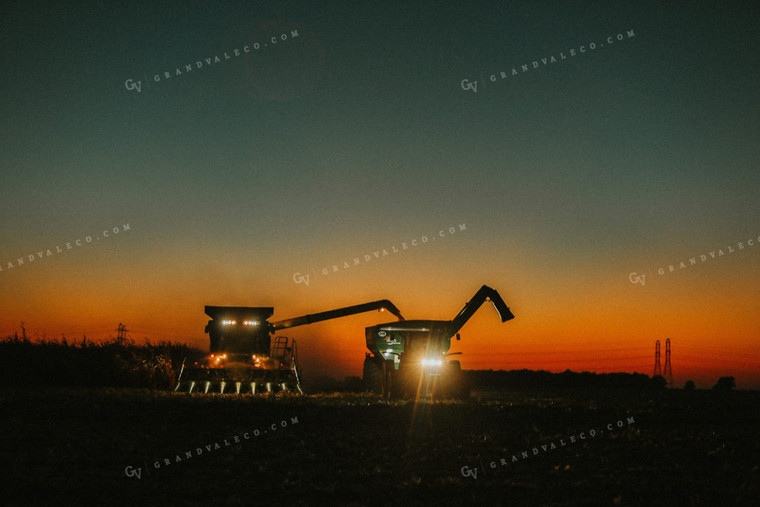 Combine and Auger Cart Harvesting Corn Field 5255