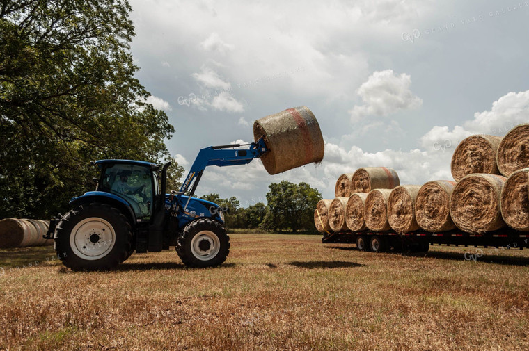 Loading Round Bale of Cornstalks 59025