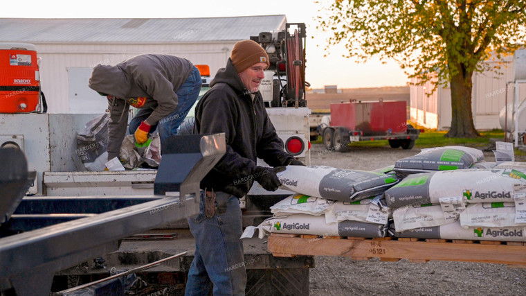 Farmers Loading Truck with Seed Bags 25190