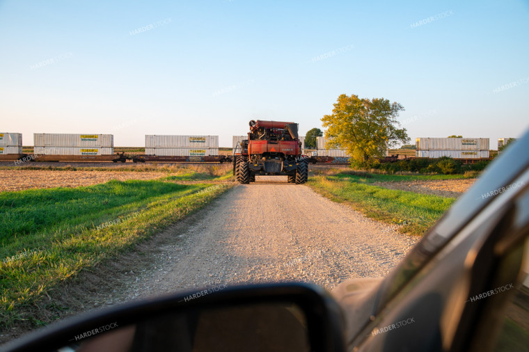 Combine Driving Down Road 25452