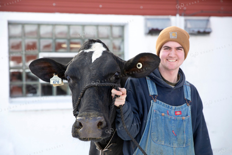 Dairy Farmer with Dairy Cow 55041