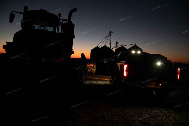 Farmer Preparing Tractor at Sunrise 25855