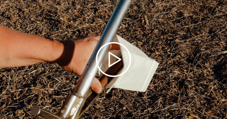 Pushing Soil Sample Core from Probe into Sample Bag 3921