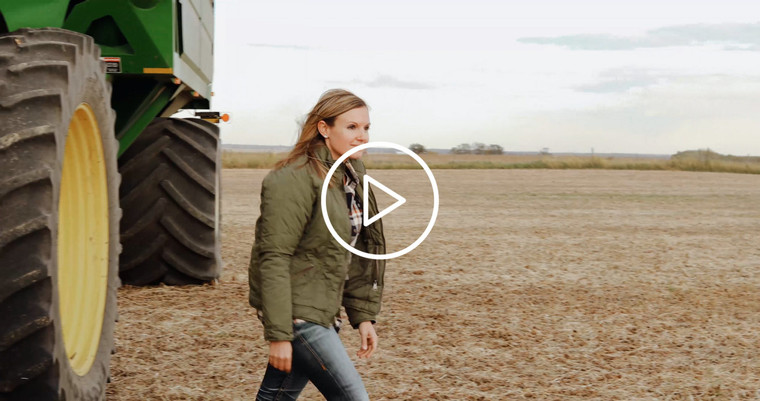 Female Farmer Climbing out of Grain Cart Tractor 3971