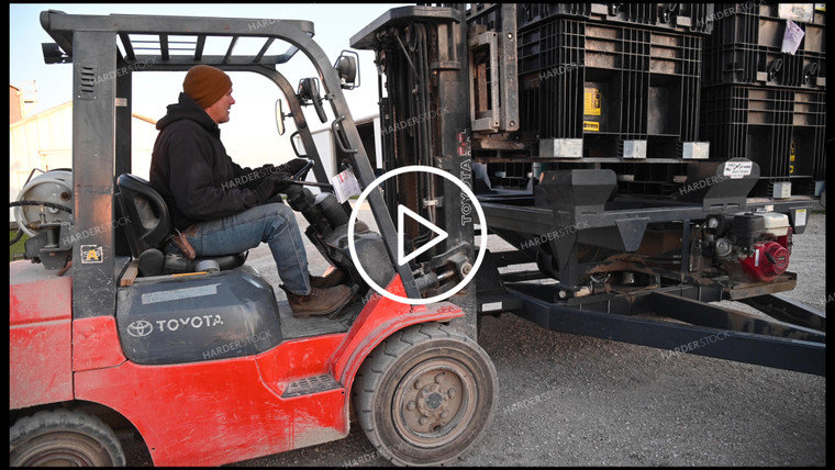 Loading the Seed Tender with a Skidsteer - 064