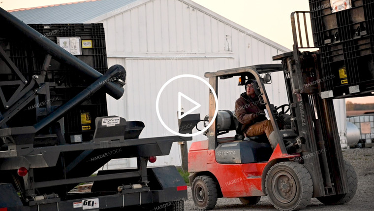 Loading the Seed Tender with a Skidsteer - 100