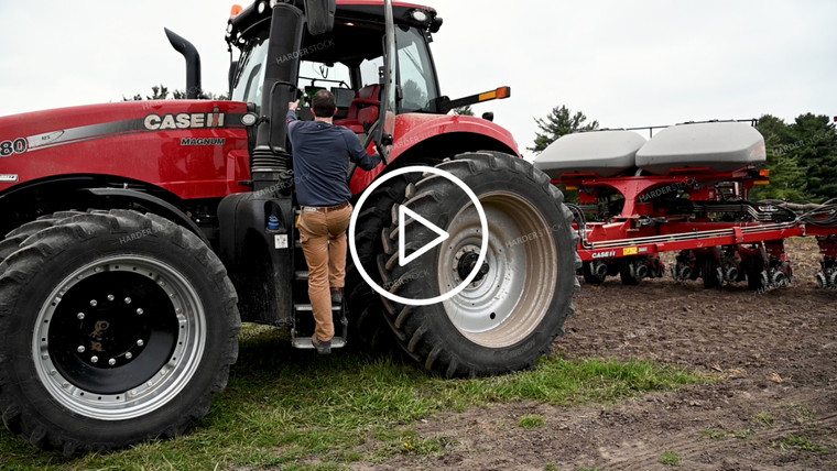 Farmer Climbing into Cab - 172