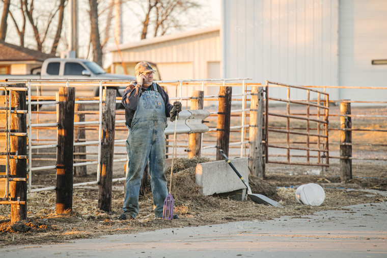 Rancher Talking on Phone 70130