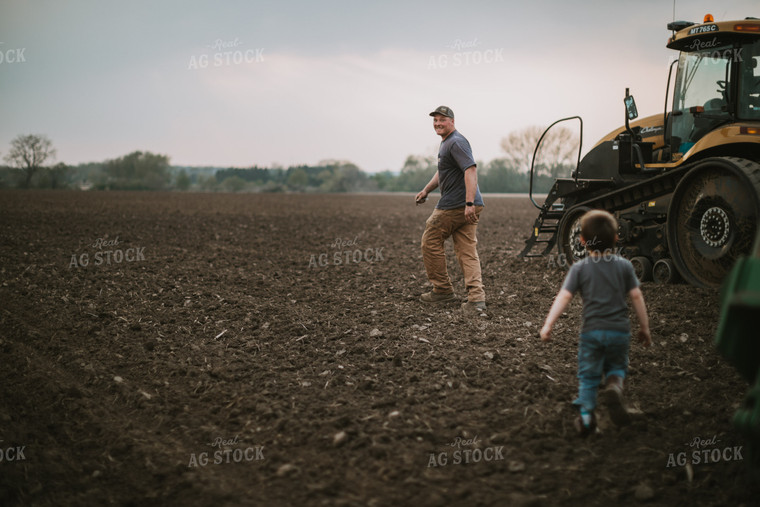 Farmer Walking Toward Planter Tractor with Farm Kid 5663