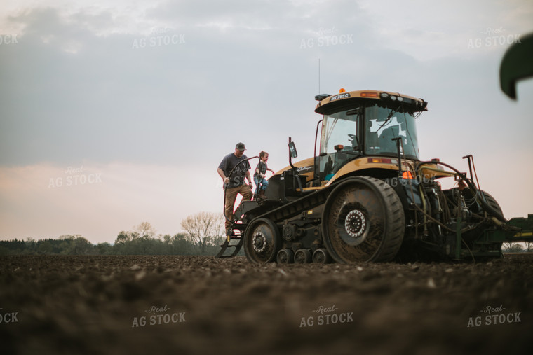 Farmer Walking Toward Planter Tractor with Farm Kid 5668