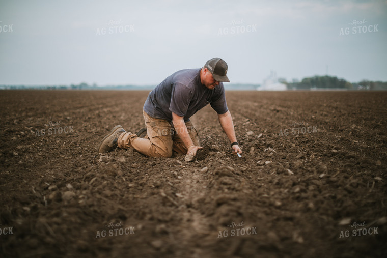 Farmer Checking Seed Depth 5678