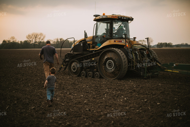 Farmer Walking Toward Planter Tractor with Farm Kid 5685