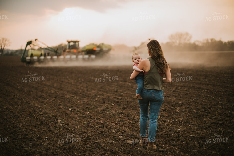 Farm Mom and Farm Kid Watching Planter Tractor 5700