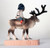 Sami Child Riding a Reindeer Carving