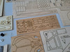 The model is made of different materials. There are thicker and thinner wooden plates.
Individual parts are made of 0.6mm veneer.
The set consists of 500 parts in.