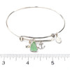 Seafoam Bright Sea Glass Adjustable Anchor Charm Bangle Bracelet on ruler for size reference.
