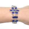 Cobalt and Cornflower Sea Glass Ombre Flower Toggle Bracelet angled on wrist
