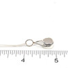 White Sea Glass Lunar Drop Charm on ruler for size reference. 