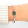 Olive Smooth Sea Glass Bezel Bangle Bracelet on model for color reference.