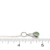 Seafoam Triangle Sea Glass Lunar Drop Charm on ruler for size reference. 