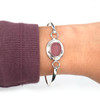Purple Perfect Oval Sea Glass Nest Hinge Bangle Bracelet on model for color reference.