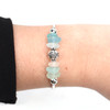 Aqua Sky Sea Glass and Pearl Daisy Bracelet on model for color reference.